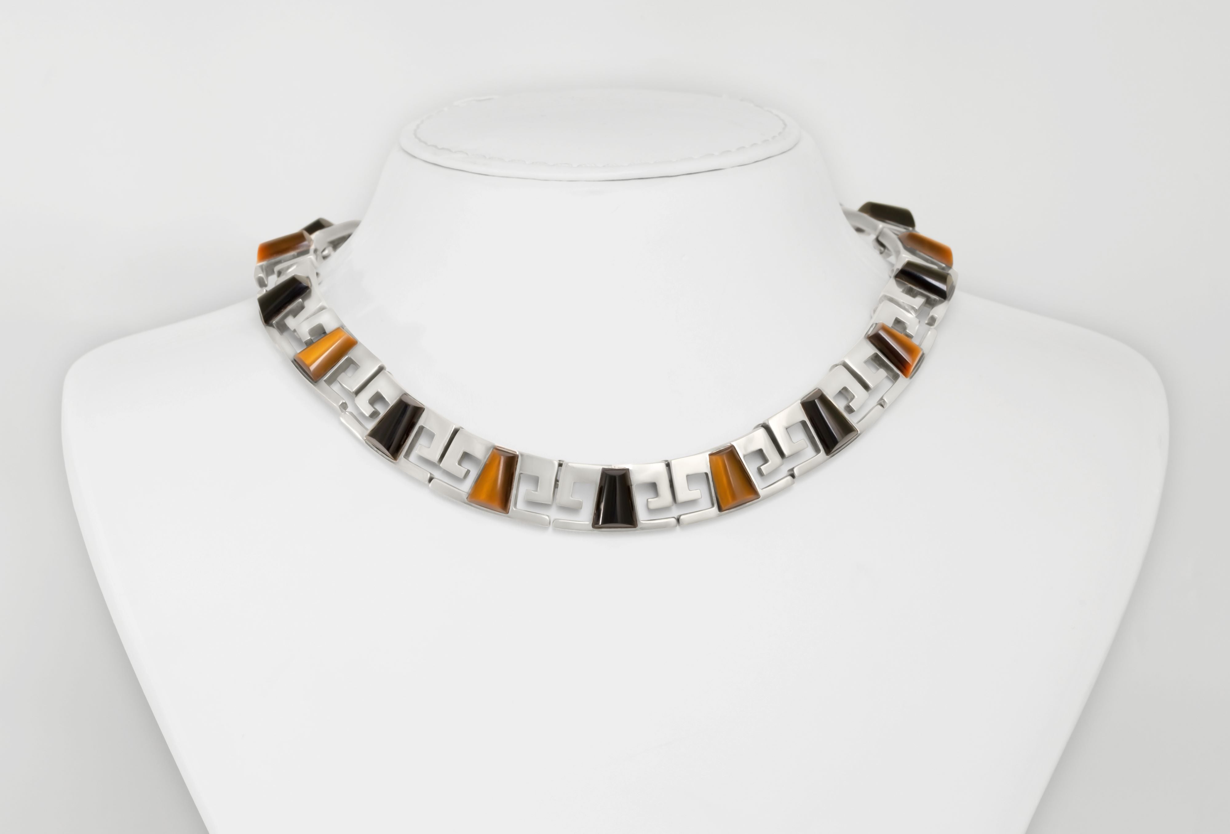 Collar-style onyx and tiger eye necklace from the 1980s-1990s.