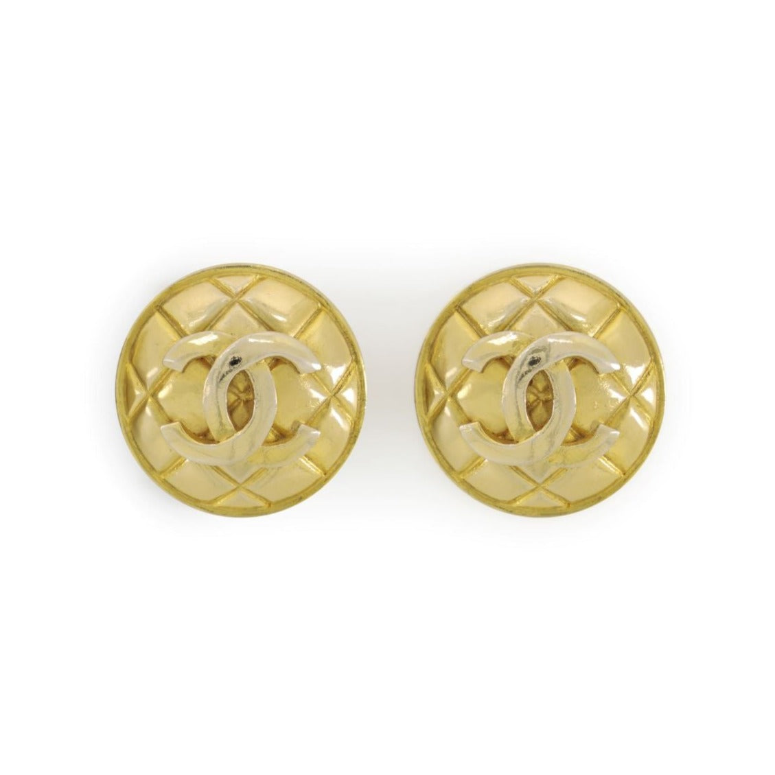 Vintage Chanel earrings with quilted button design