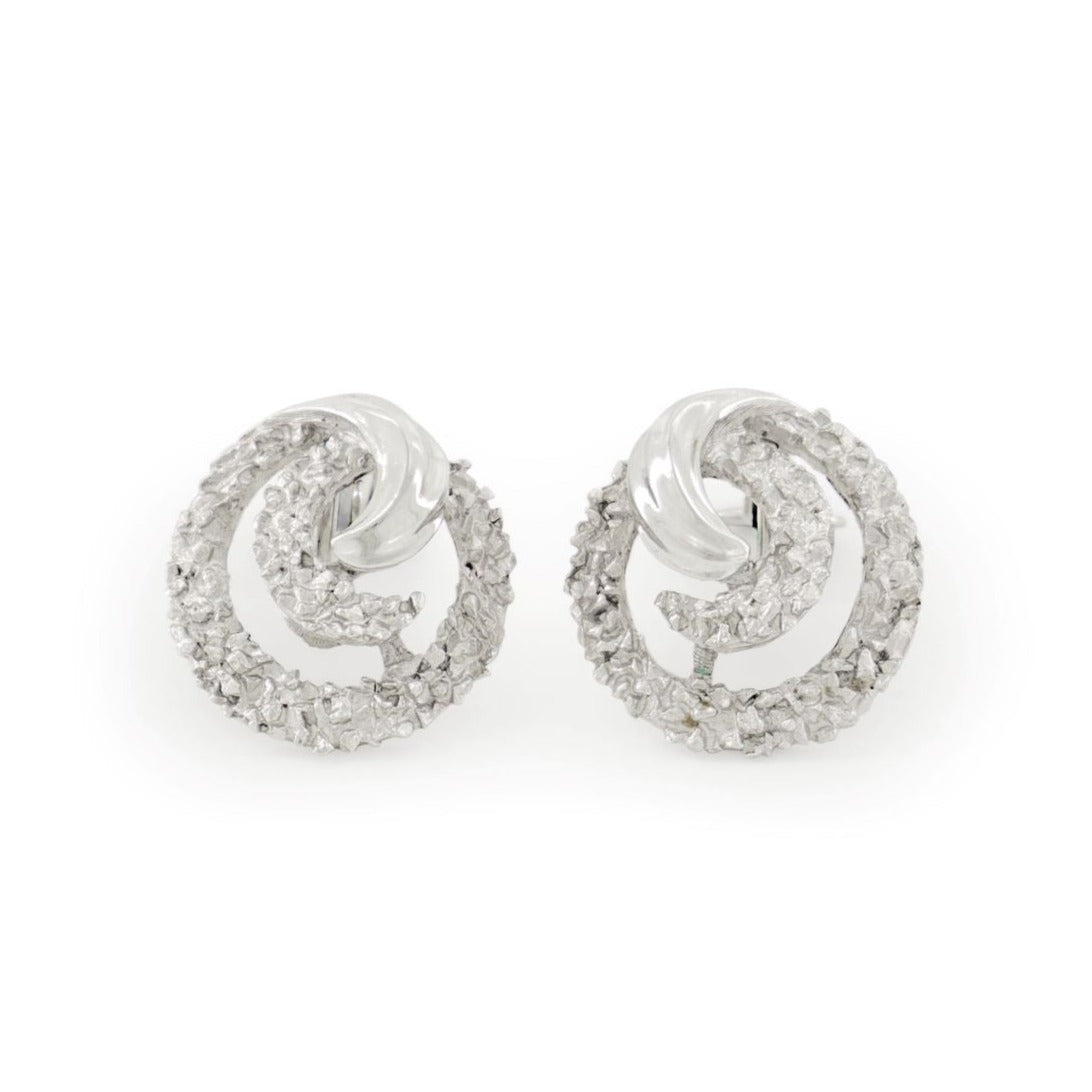 Trifari clip earrings with a swirl design