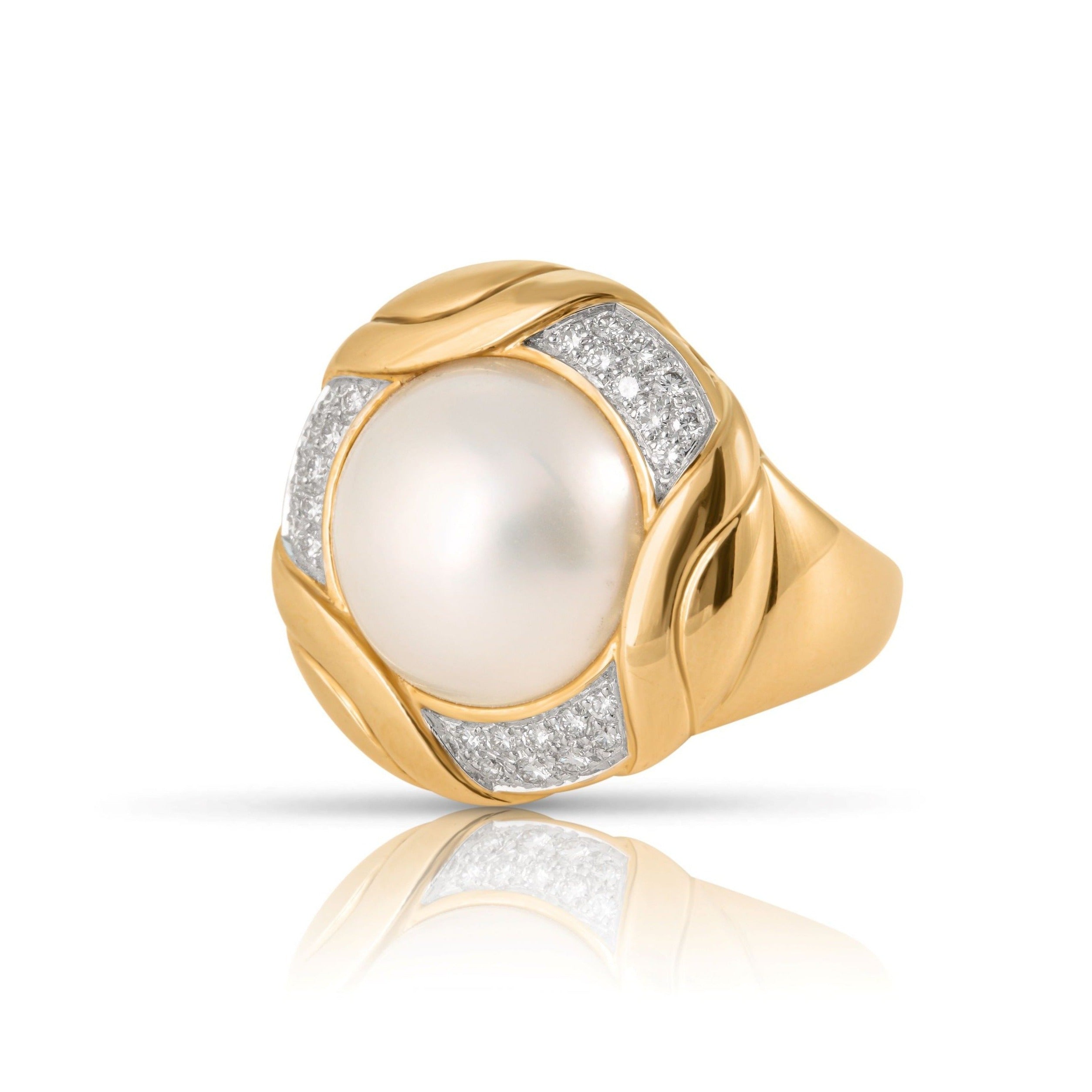 Vintage gold pearl ring with mabé cultured pearl and diamonds.