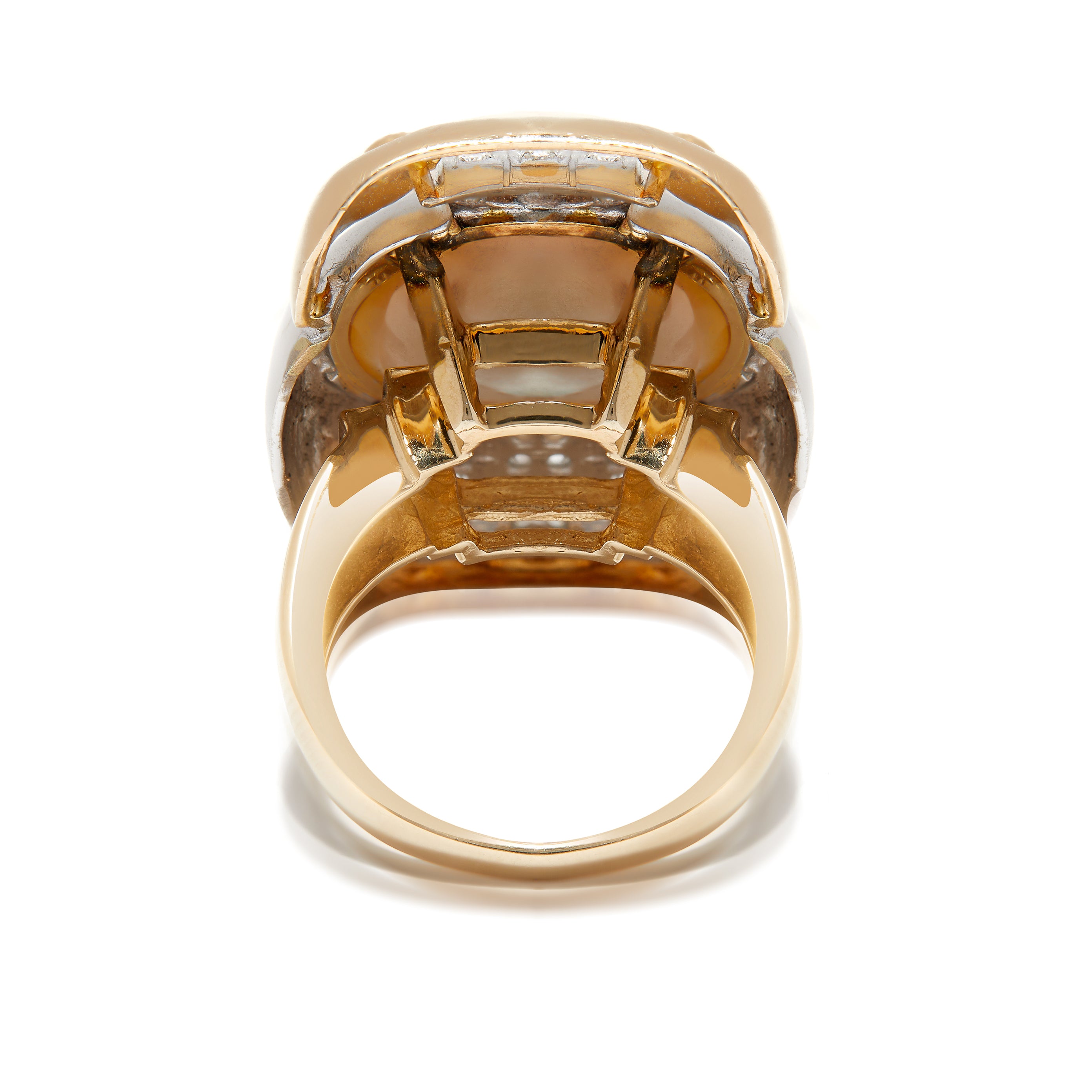 Back view of gold pearl and diamond ring. 