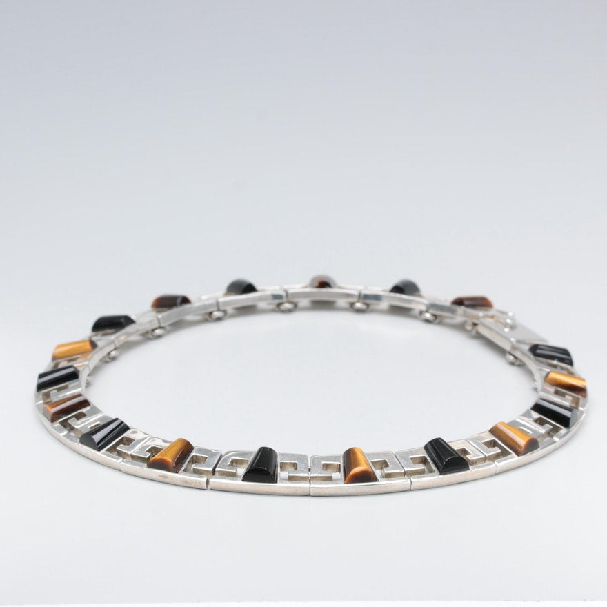 Sterling silver necklace with black onyx and tiger eye stones. 