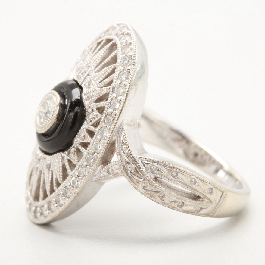 Split and twisted shoulders on vintage Art Deco-style ring.