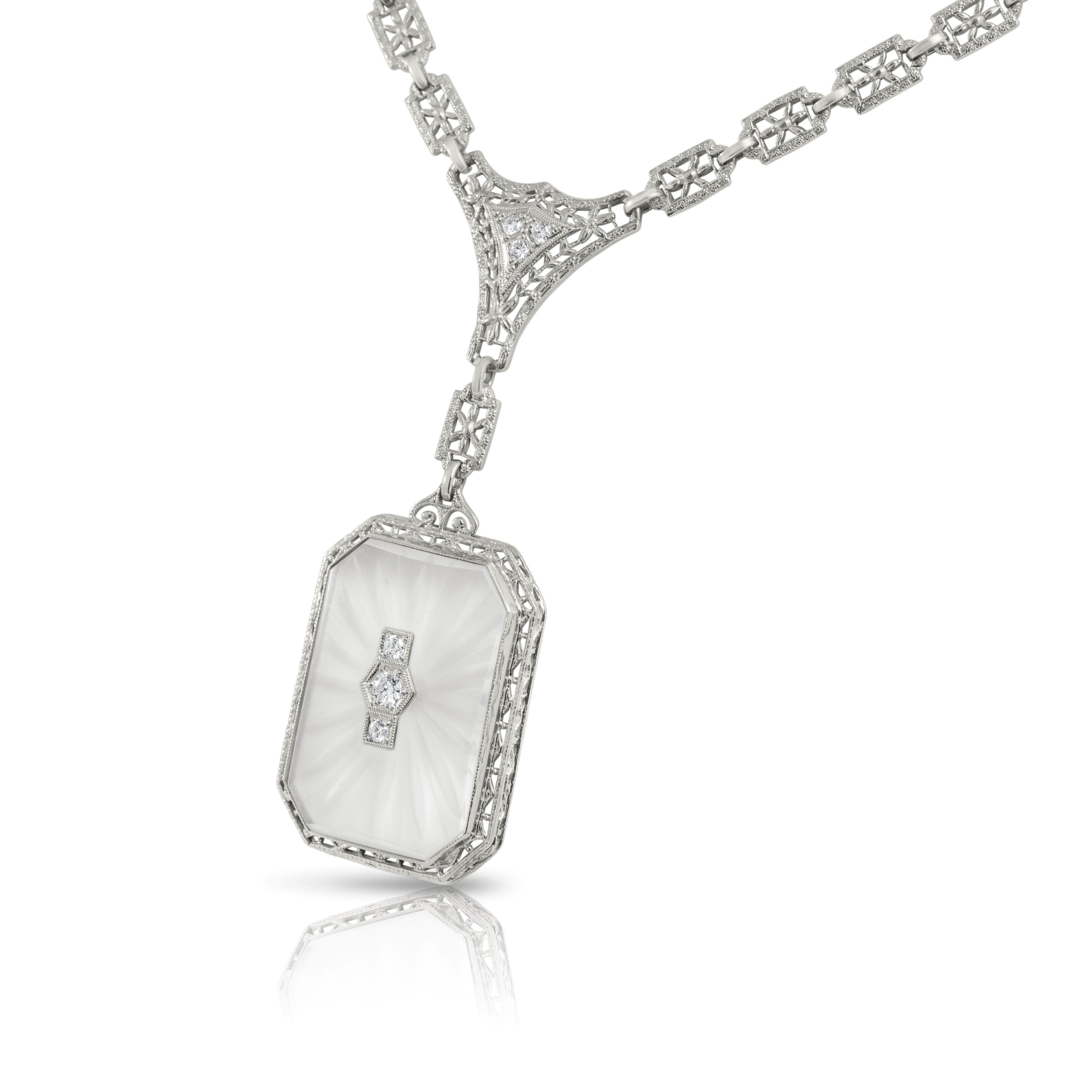 Art Deco clear quartz necklace in platinum and diamond accents.