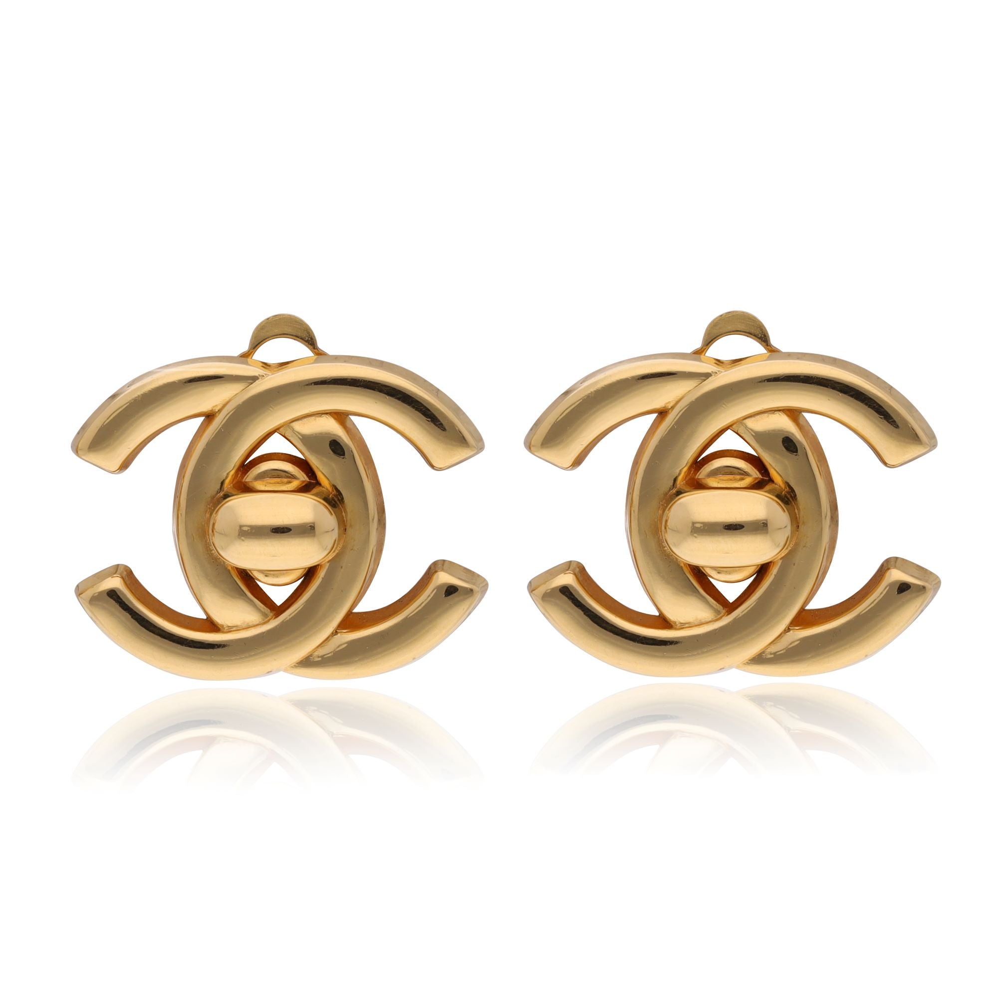 Chanel vintage tun lock ear clips front