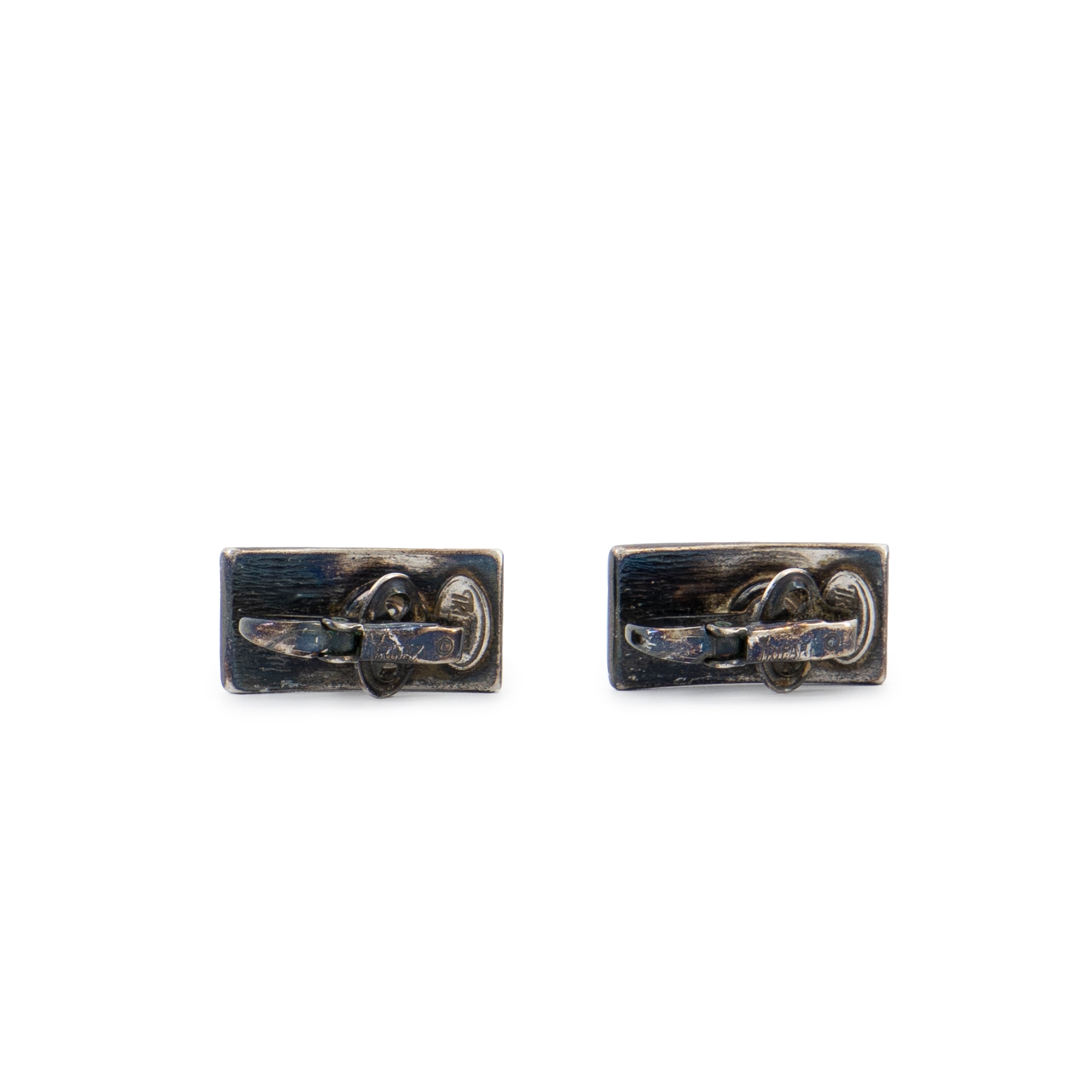 Signed closure side of vintage Trifari black oxidised earrings