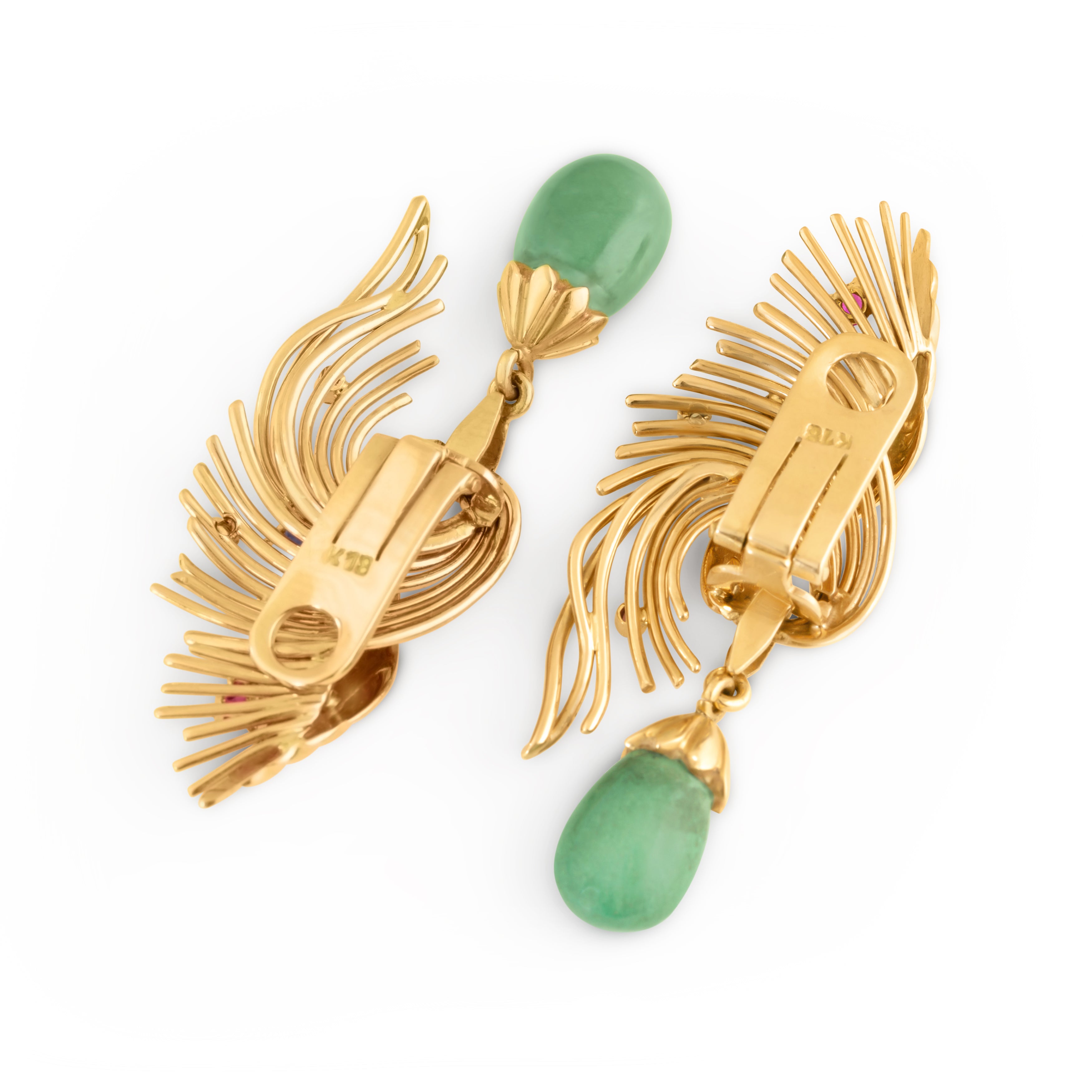 Clip-on closure on vintage gold and turquoise earrings.