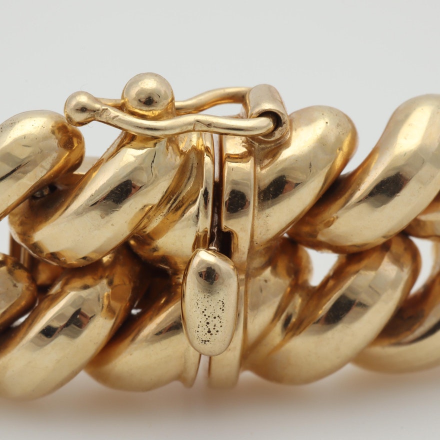 Box-tab-insert closure on 14ct gold link bracelet.