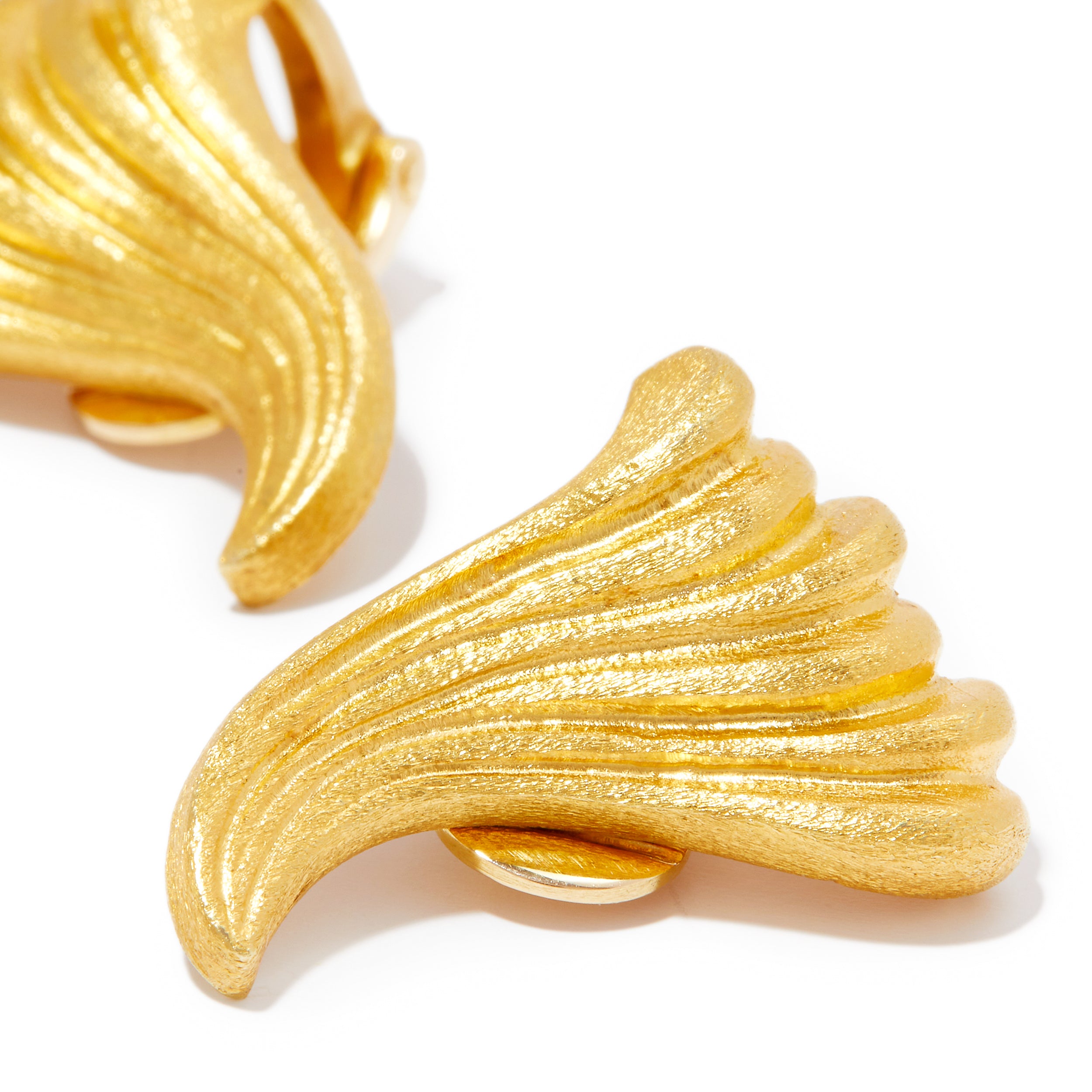 980s Maramenos & Pateras 18ct gold earrings in a wave design.