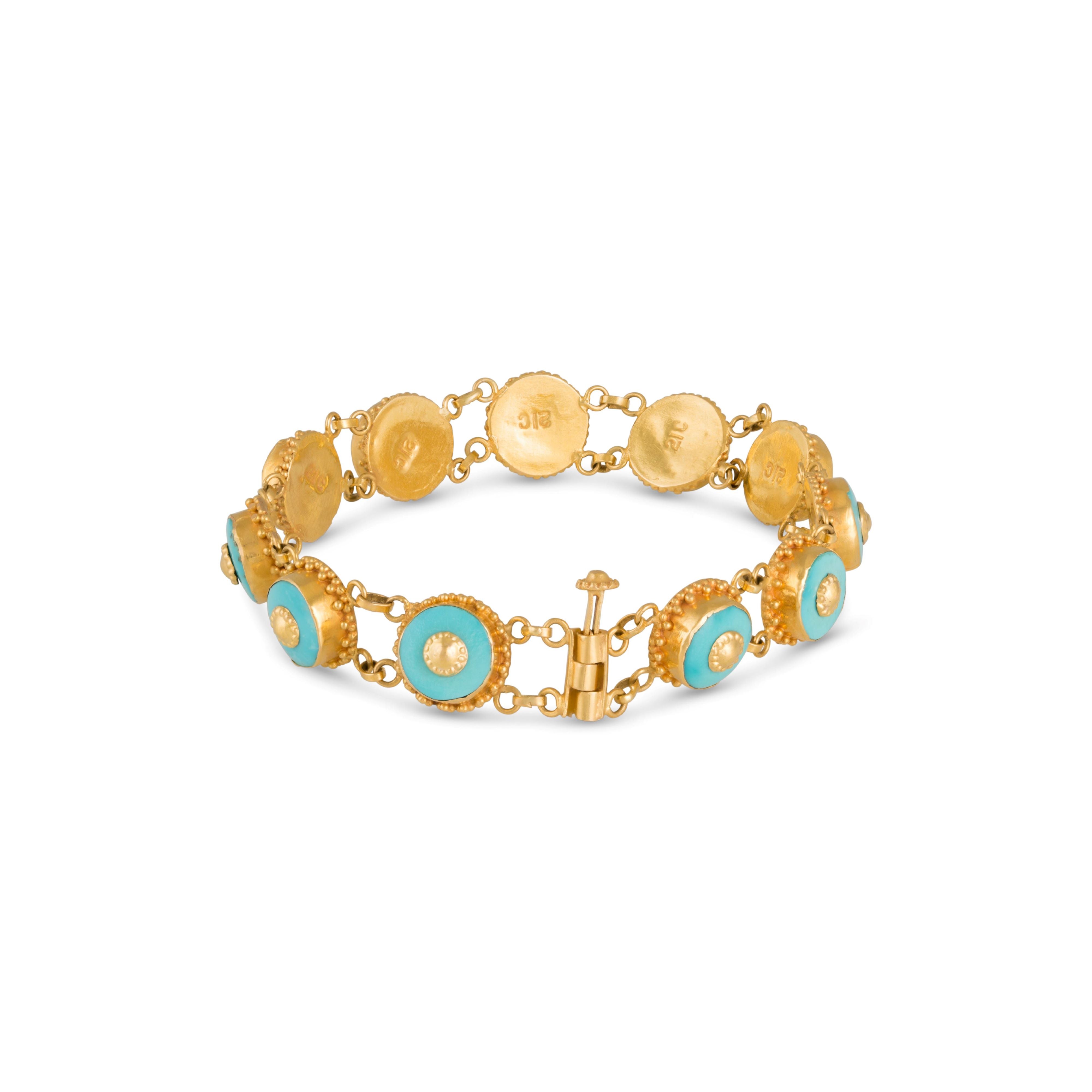 Slide lock on vintage gold and turquoise bracelet. 
