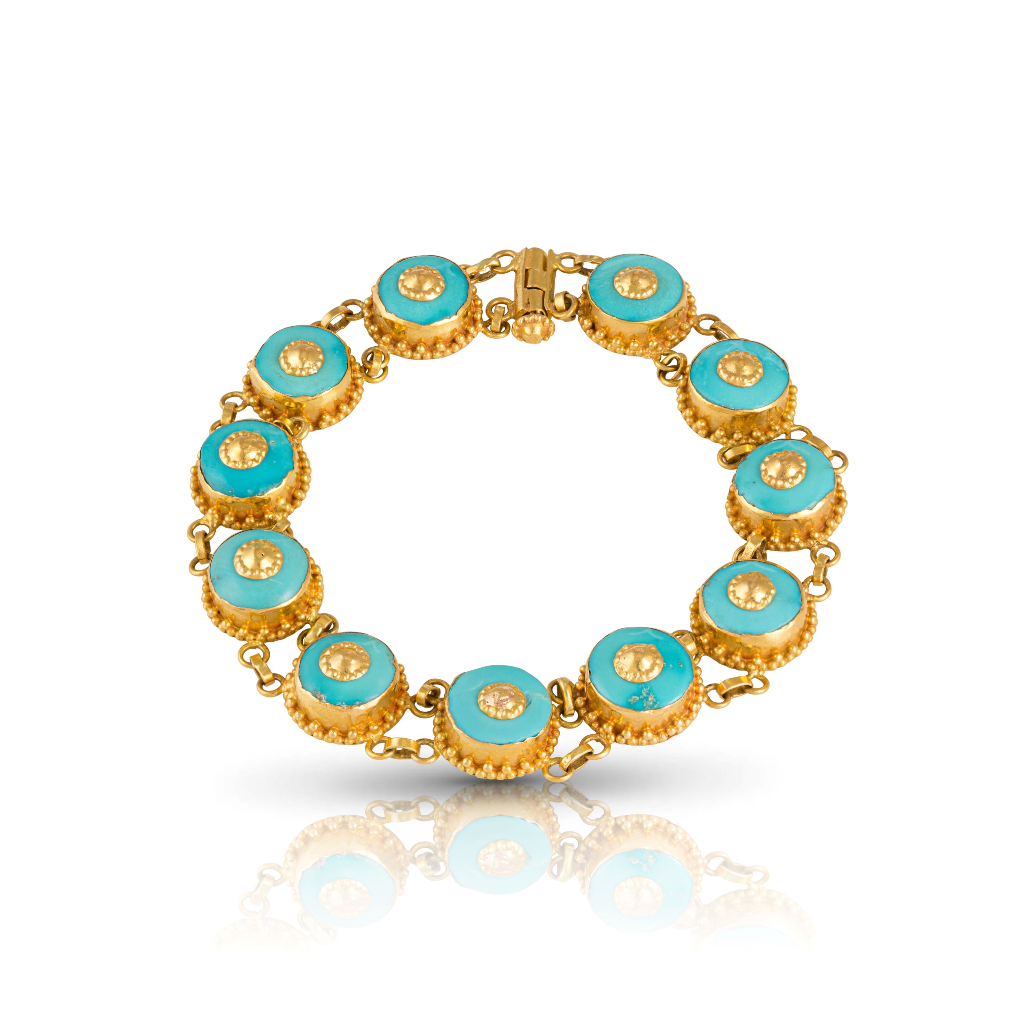 Vintage turquoise bracelet in 14ct gold button motif.