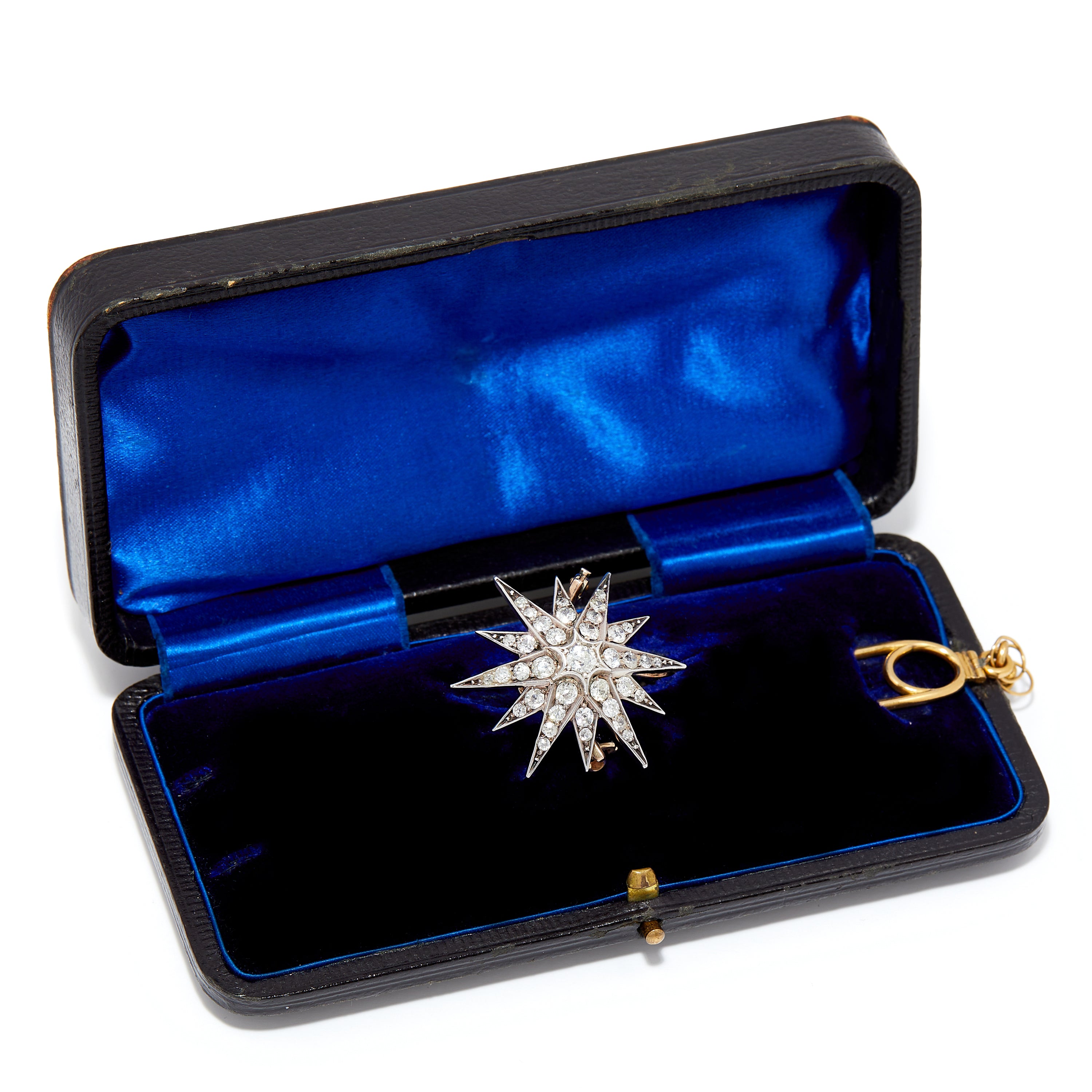 Victorian starburst diamond brooch in its original case. 