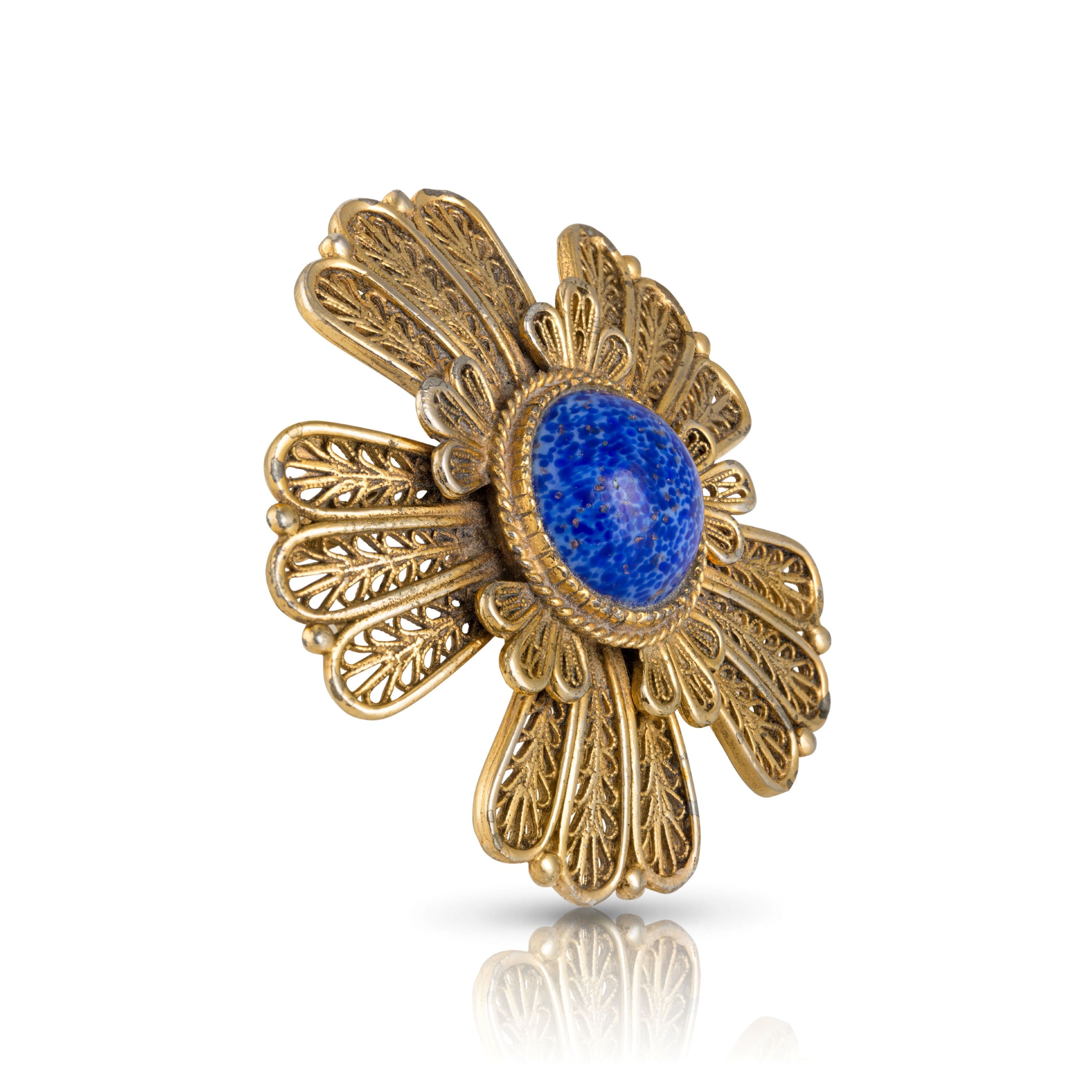 Side front view of the 1960s vintage faux Lapis Lazuli designer brooch