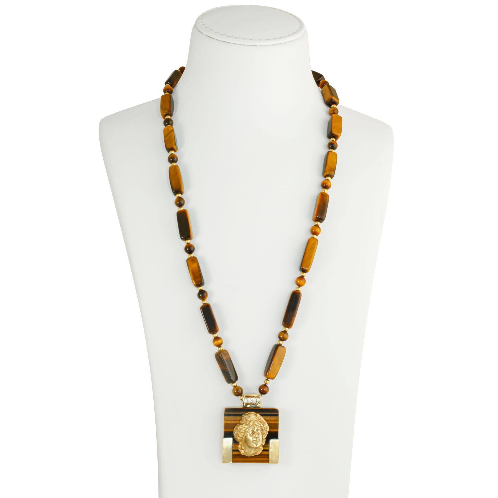 Vintage 1980s vintage tiger eye pendant necklace with 14ct gold female portrait.