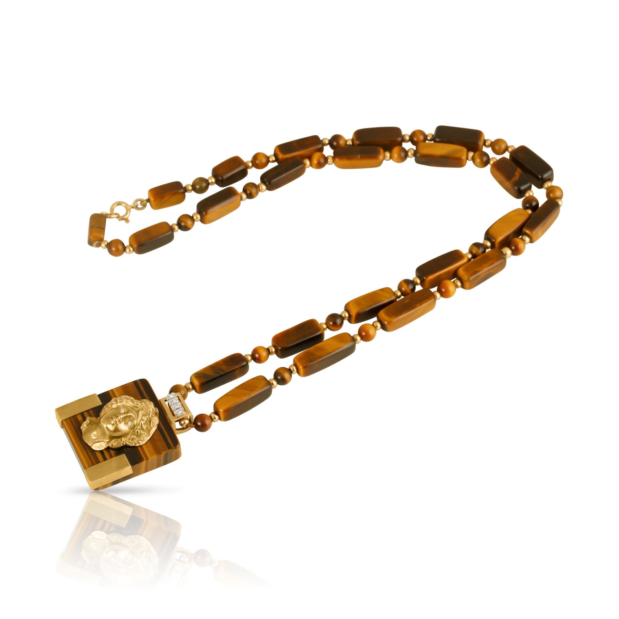 Tiger eye necklace with 14ct gold female portrait pendant.