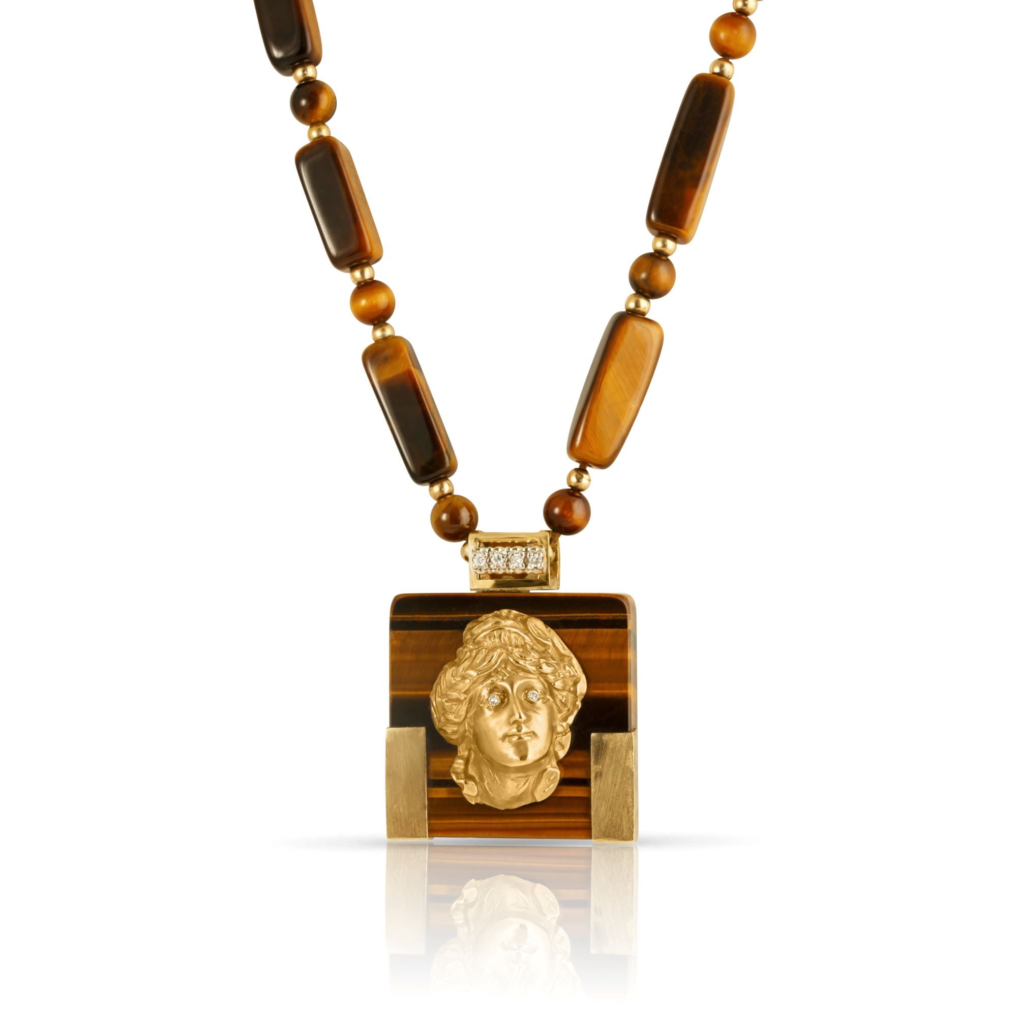 Tiger eye necklace with articulated gold female portrait.