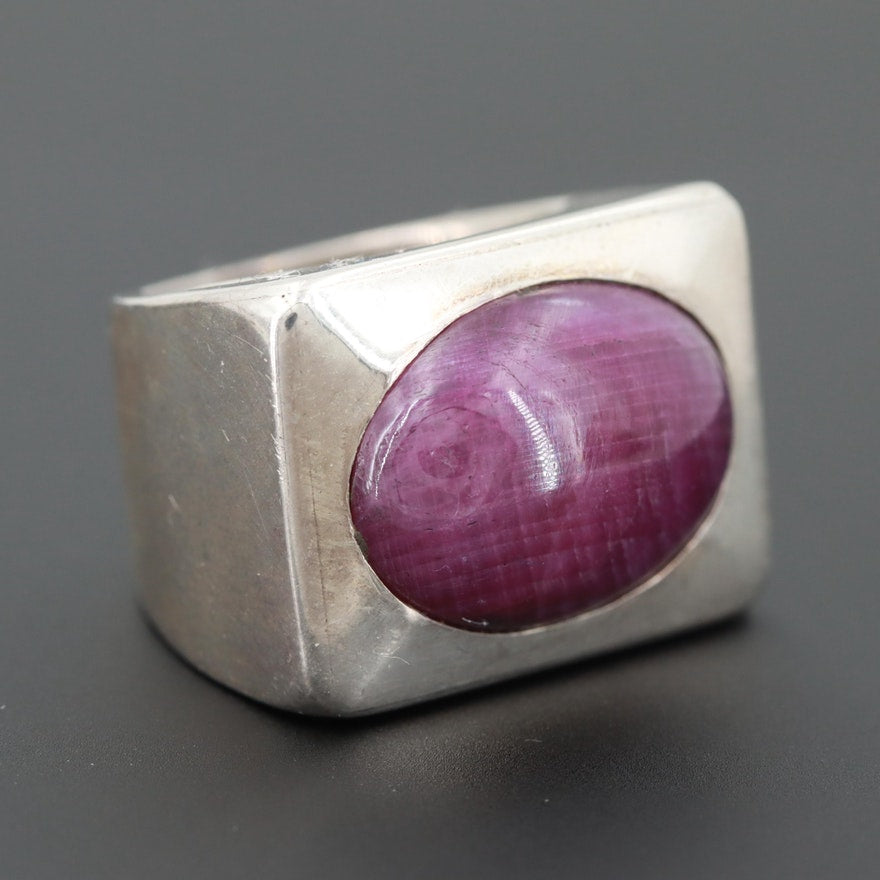 Barry Brinker designer ring in sterling silver with purple corundum stone. 