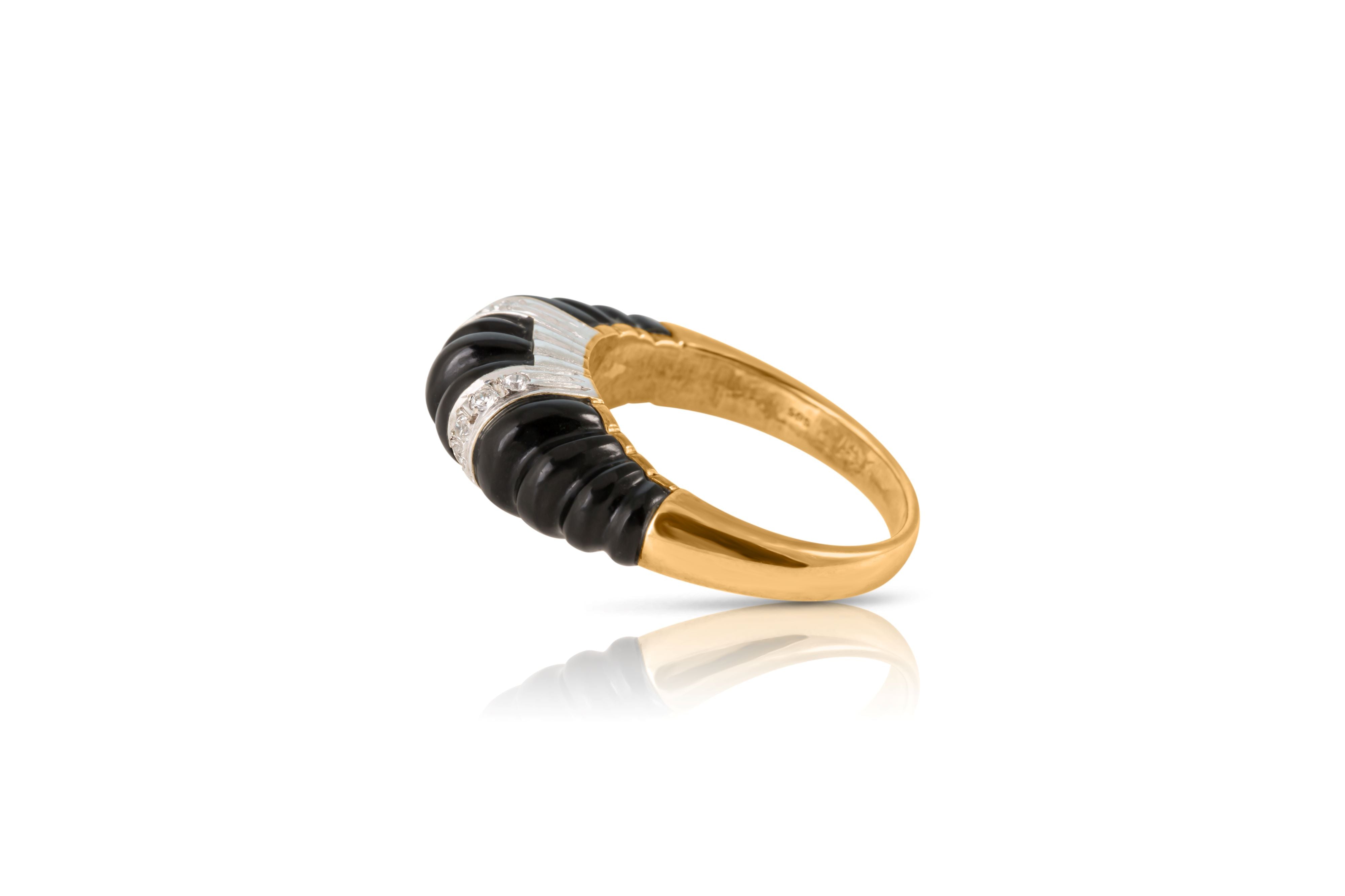 Side view of 14ct gold ring with black onyx and diamonds.