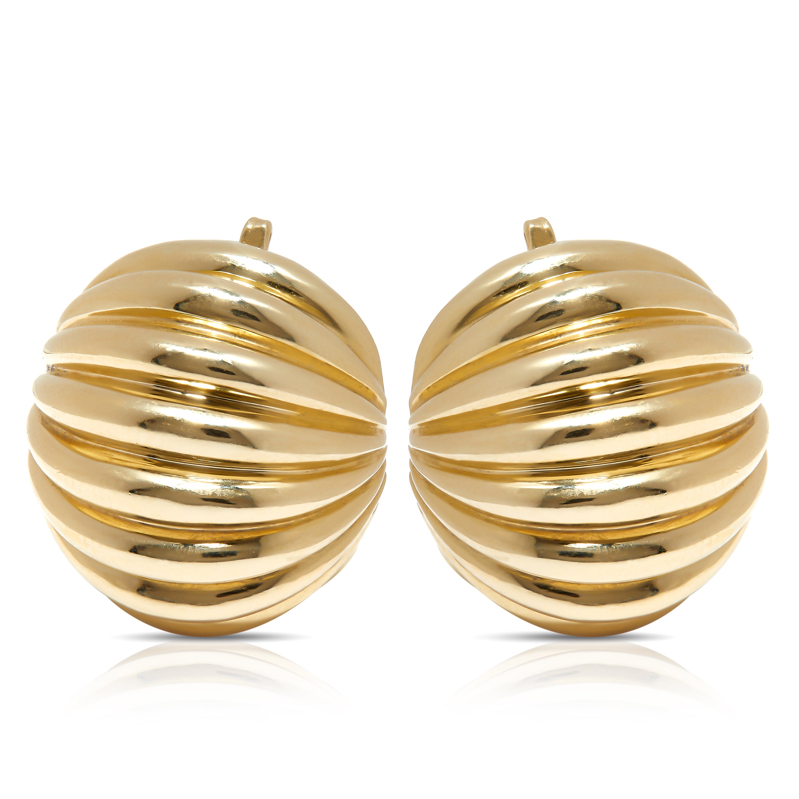 Gold clip earrings in fluted dome design.